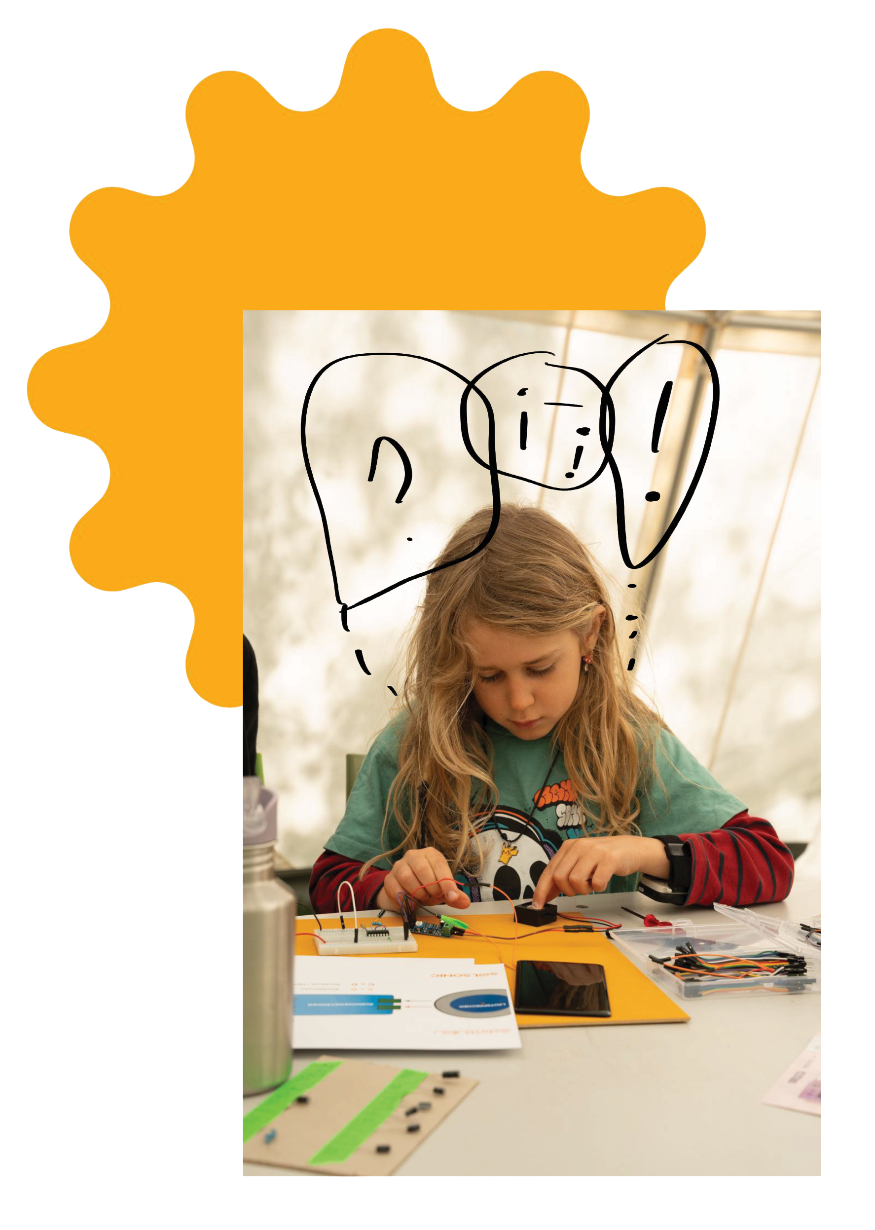 A child experimenting with a Solsonic circuit at a workshop